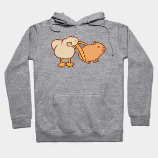 Pelican trying to eat a capybara Hoodie